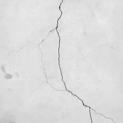 A Settled/cracked unreinforced concrete foundation in Struthers